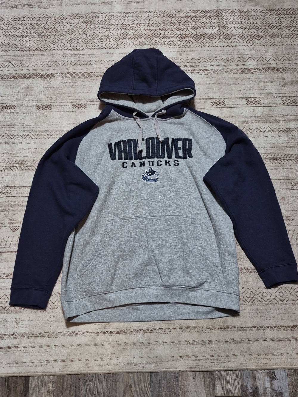 NHL Vancouver Canucks Gray and Navy Raglan Hoodie